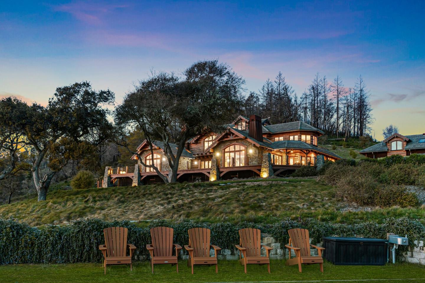 2088 Green Oaks Way Pescadero, CA 94060 - Photo 1 of 1 a front view of a house with a yard and trees