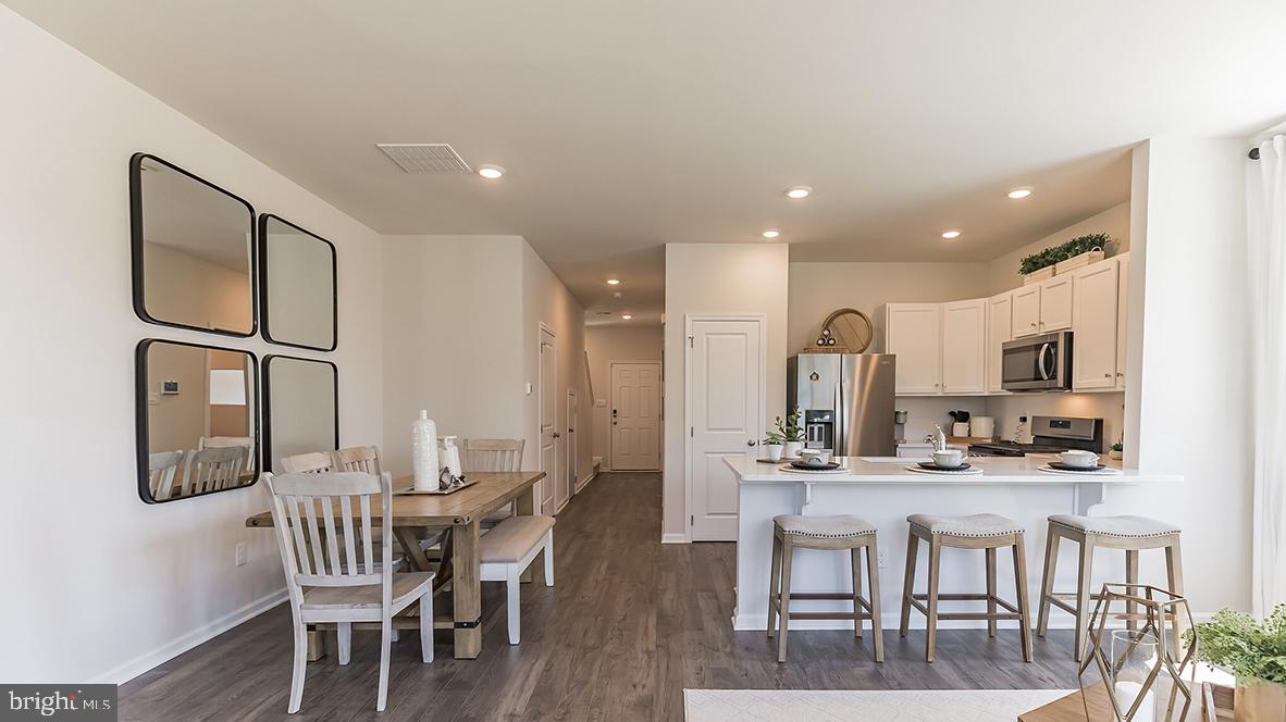 92 Arlotta Street Glassboro, NJ 08028 - Photo 13 of 25 a large kitchen with a table and chairs