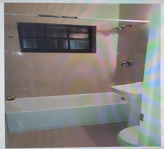 a bathroom with a bathtub