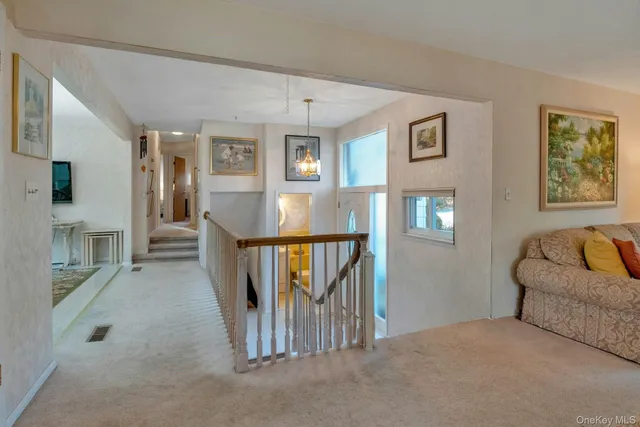 a view of livingroom with furniture and windows