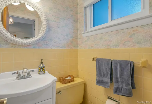 a bathroom with a toilet and a sink