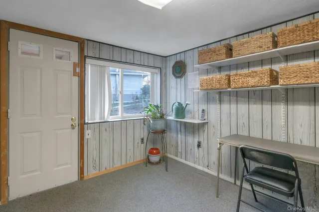 a view of an entryway with a livingroom