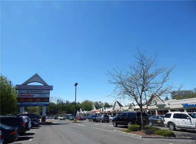 a view of a building with a street