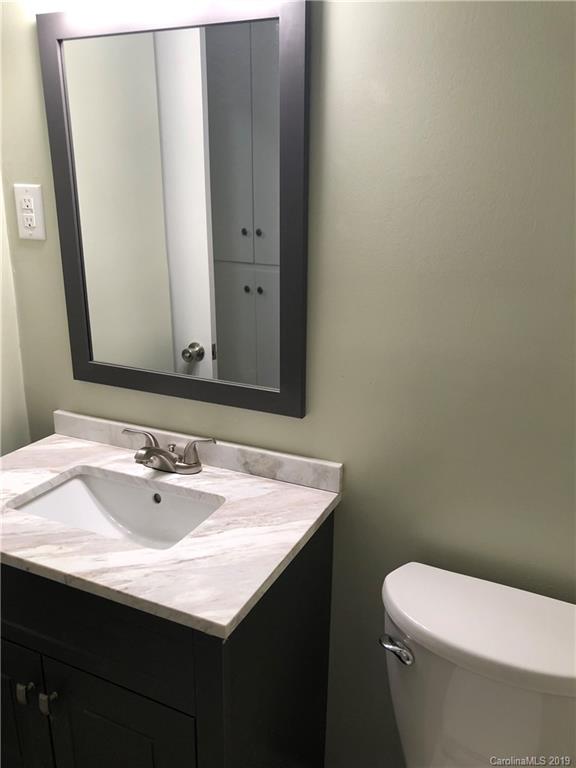 141 South Hillside Street Rutherfordton, NC 28139 - Photo 6 of 7 a bathroom with a sink and a toilet