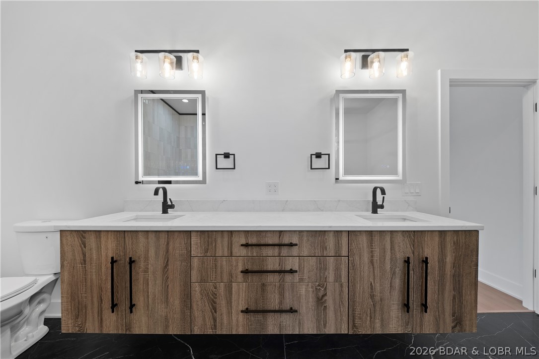 222 Red Bud Road Lake Ozark, MO 65049 - Photo 32 of 64 Double vanity with modern cabinetry, quartz counte