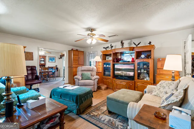 a bathroom with a toilet a sink and a mirror
