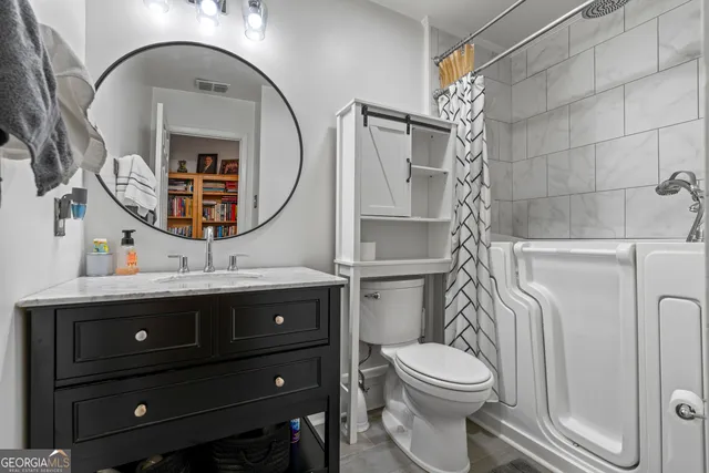 a view of lake with green space