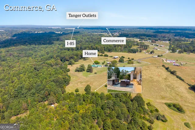 a house with swimming pool in front of it