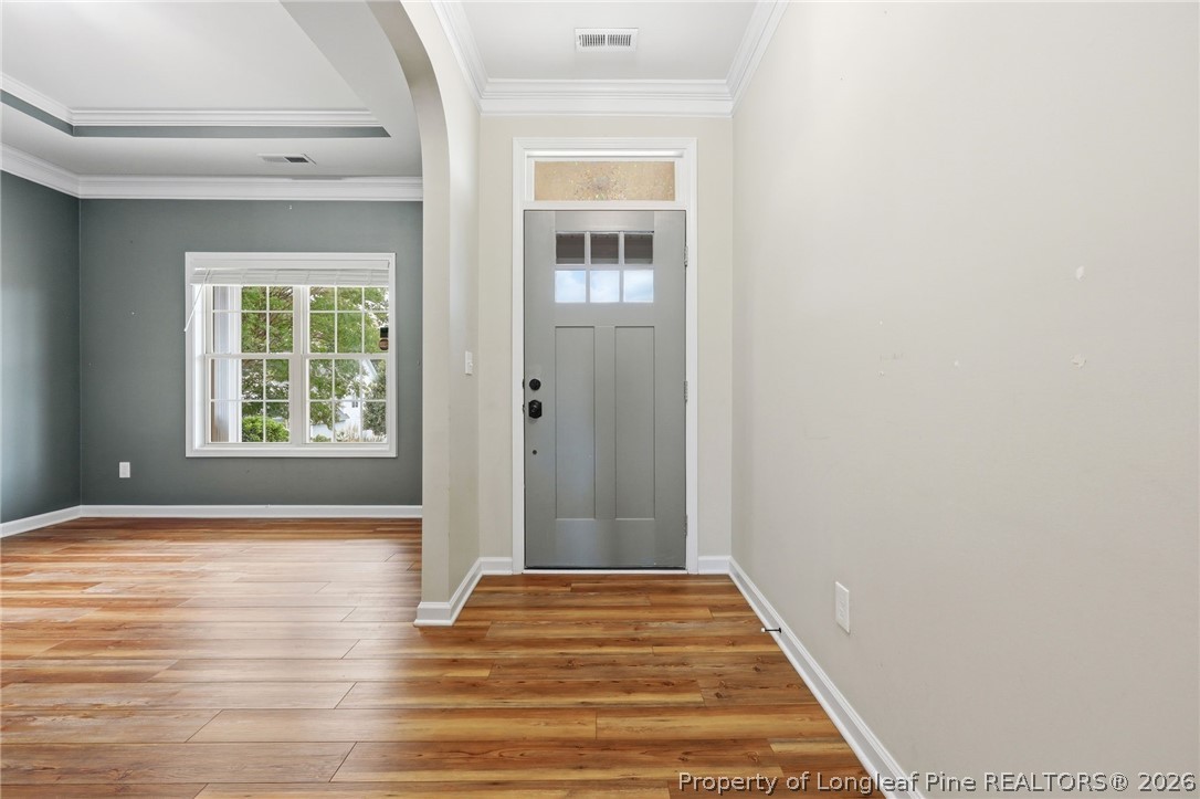 33 Colonist Place Cameron, NC 28326 - Photo 6 of 47 a view of an empty room with wooden floor and a window
