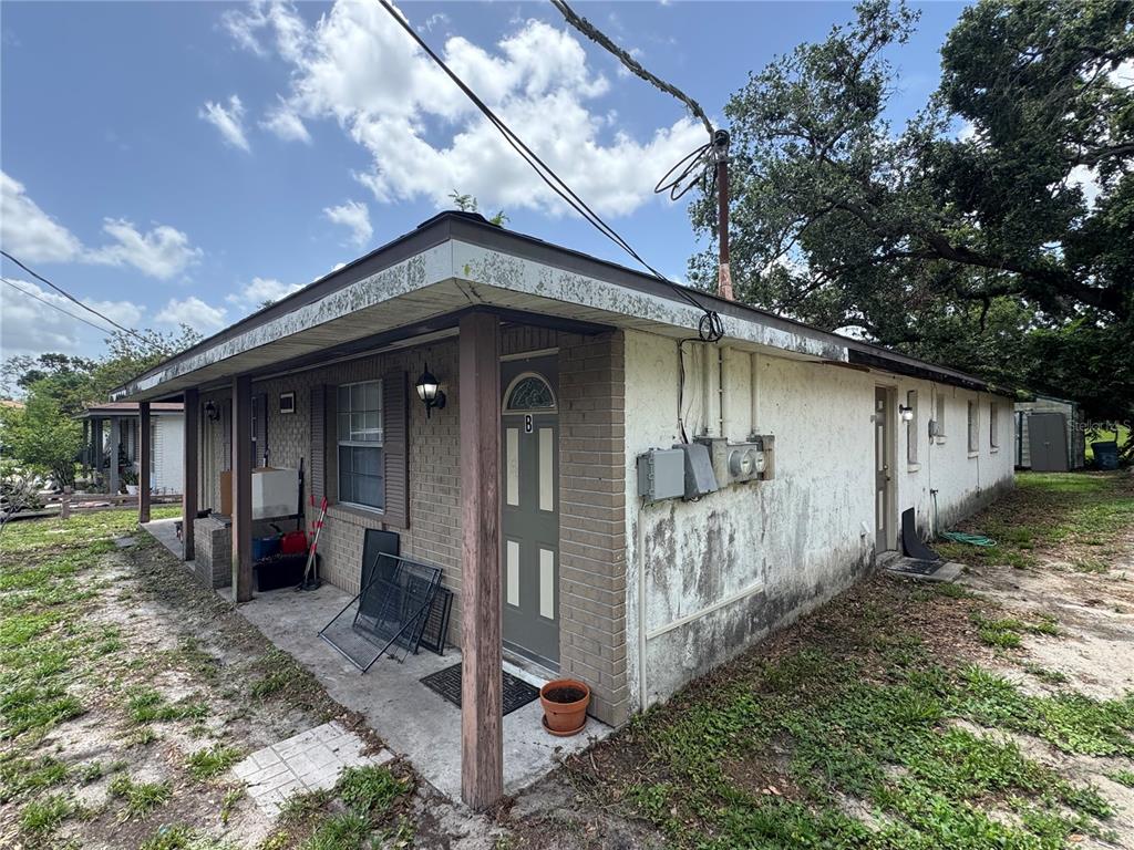 1004 Melrose Street Seffner, FL 33584 - Photo 21 of 40 a front view of a house with a porch