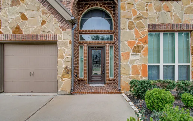 front view of a brick house with a door