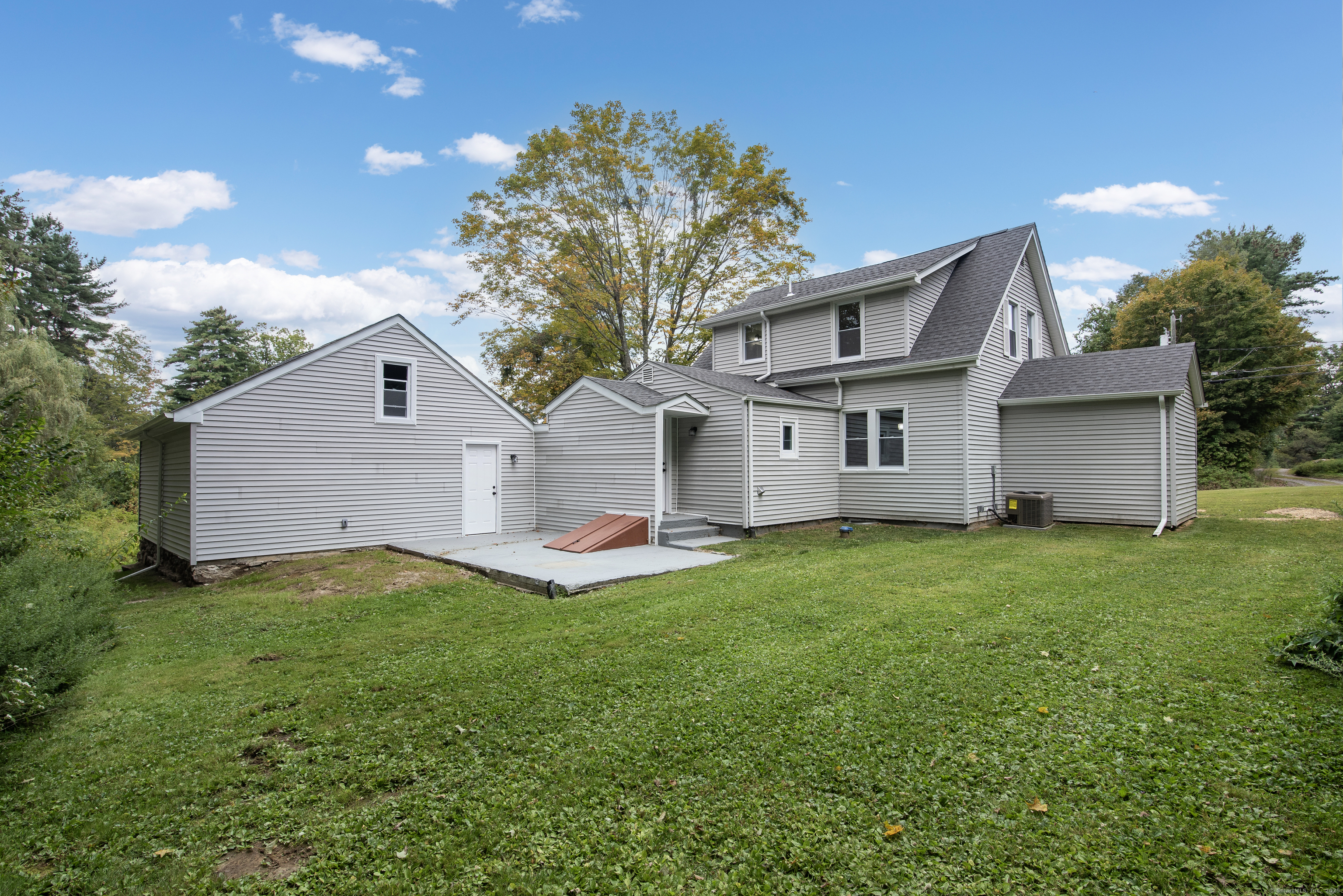 260 Hayden Hill Road Torrington, CT 06790 - Photo 4 of 18 a view of a backyard with a garden