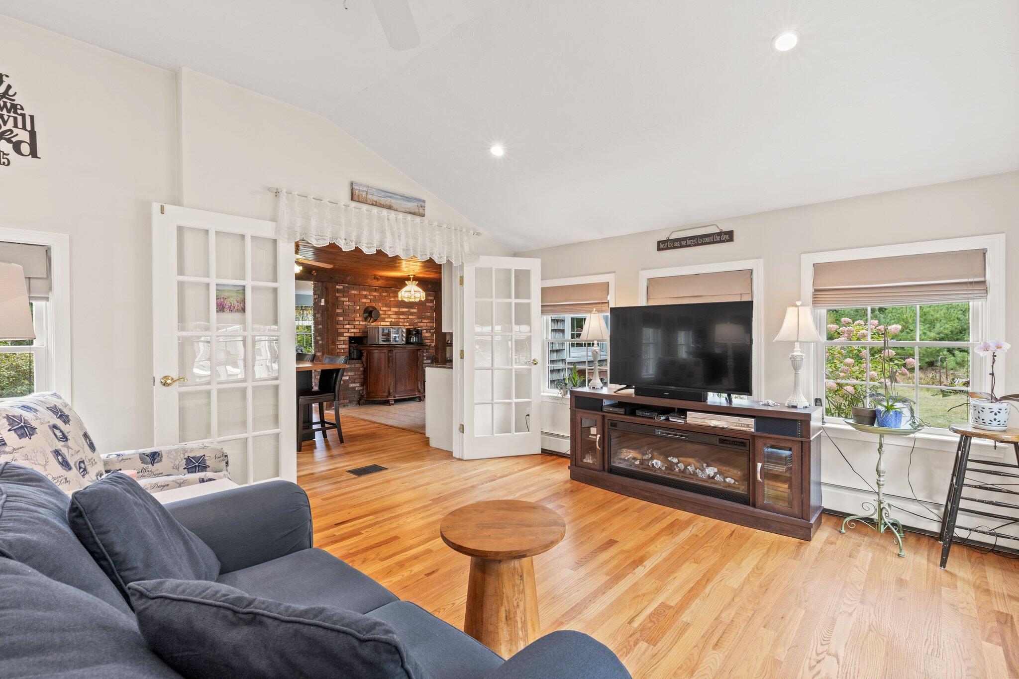 3 Fathom Lane Wareham, MA 02571 - Photo 13 of 57 a living room with furniture and a flat screen tv