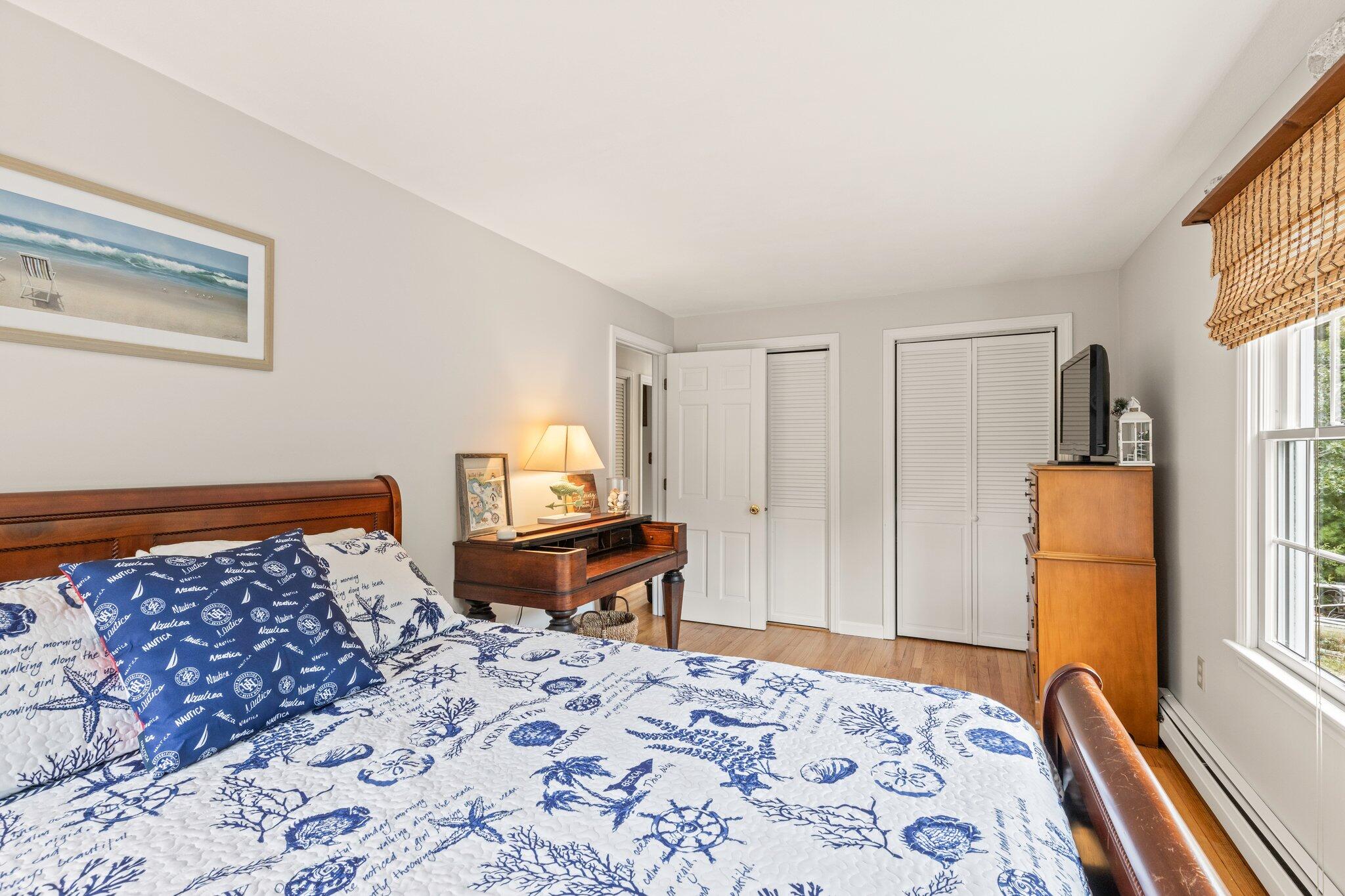 3 Fathom Lane Wareham, MA 02571 - Photo 21 of 57 a bedroom with a bed and wooden floor