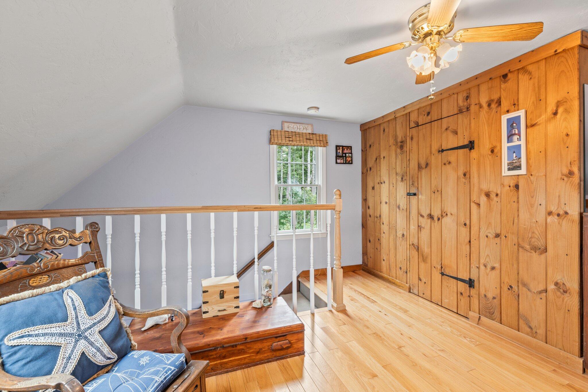 3 Fathom Lane Wareham, MA 02571 - Photo 26 of 57 a view of a bedroom with wooden floor and furniture