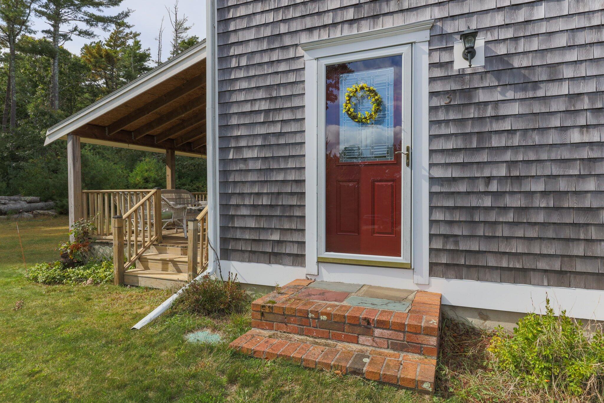 3 Fathom Lane Wareham, MA 02571 - Photo 32 of 57 a front view of a house with garden