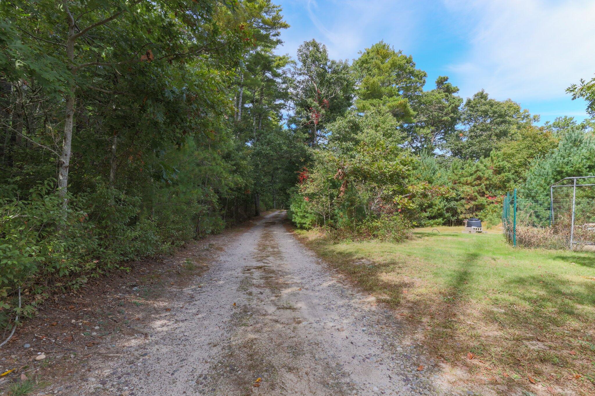3 Fathom Lane Wareham, MA 02571 - Photo 39 of 57 a view of a yard with a tree