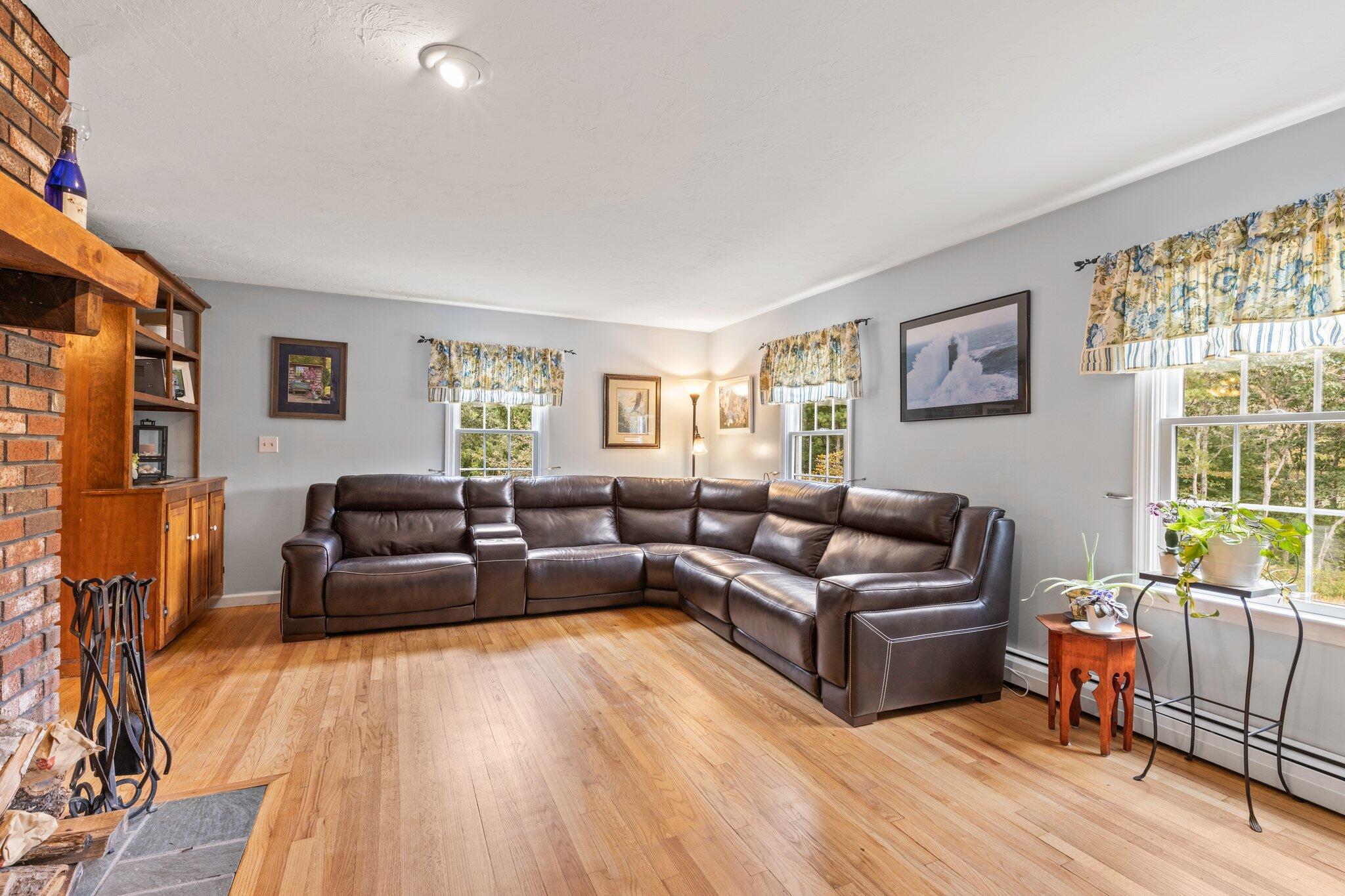 3 Fathom Lane Wareham, MA 02571 - Photo 4 of 57 a living room with furniture and a flat screen tv