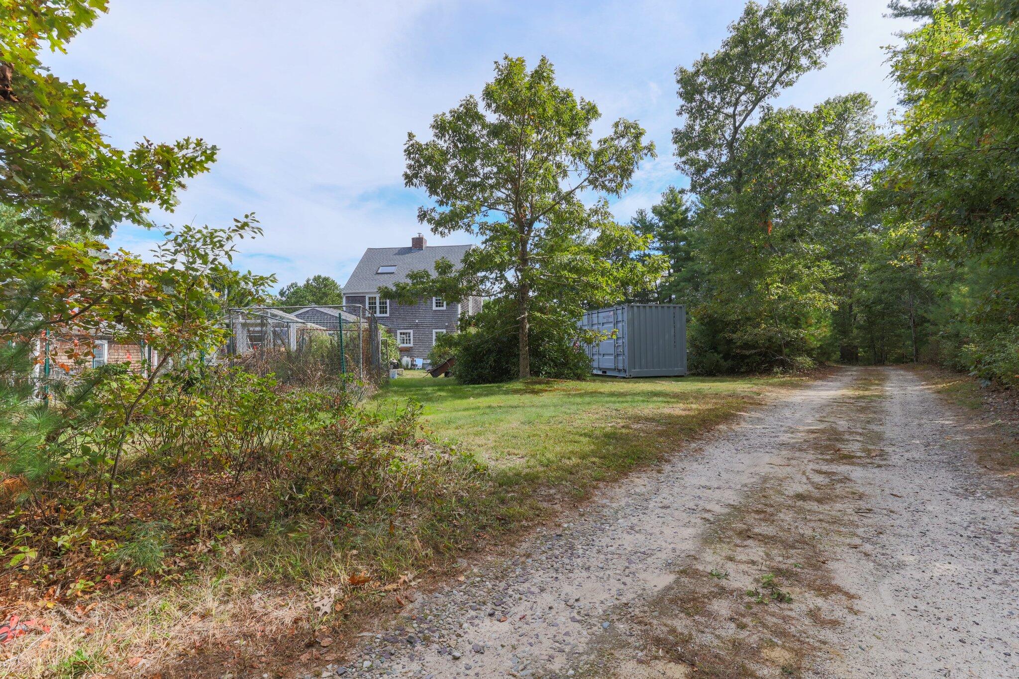 3 Fathom Lane Wareham, MA 02571 - Photo 41 of 57 a view of a yard with plants and trees