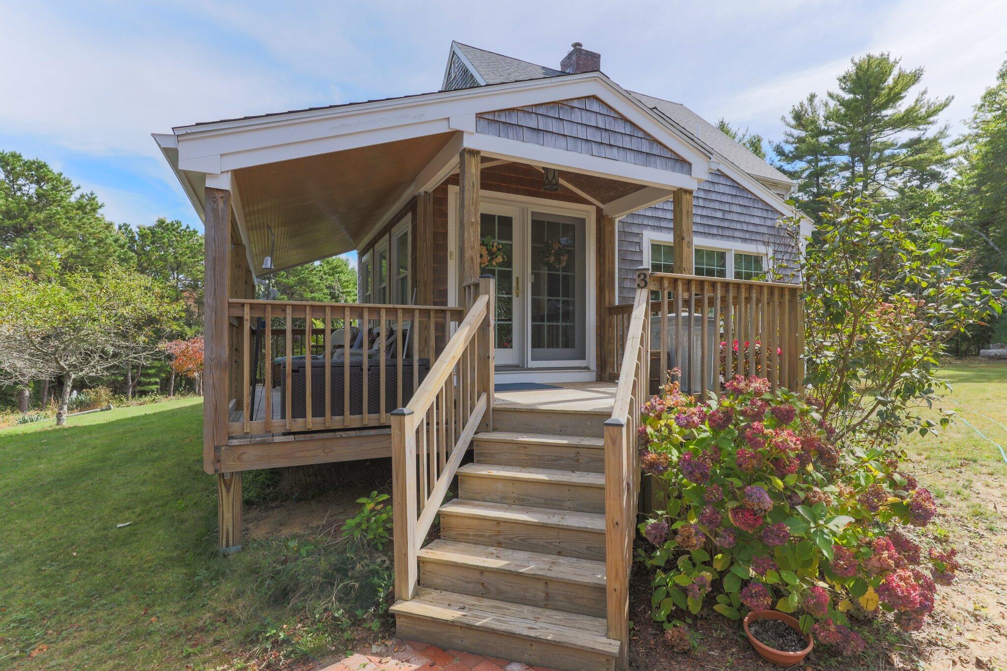 3 Fathom Lane Wareham, MA 02571 - Photo 50 of 57 a view of a house with backyard and deck