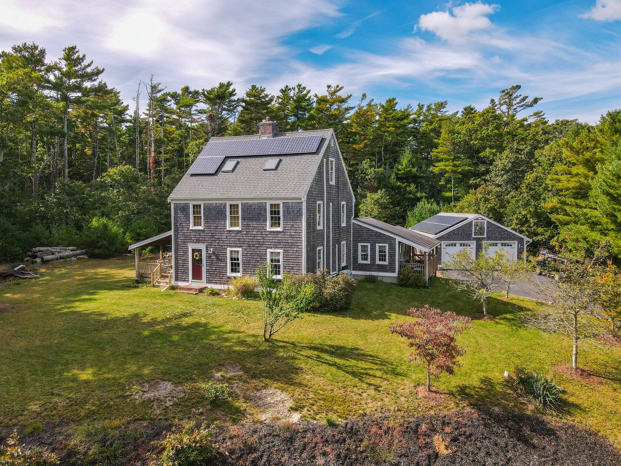 3 Fathom Lane Wareham, MA 02571 - Photo 56 of 57 a view of a big house with a big yard and large trees