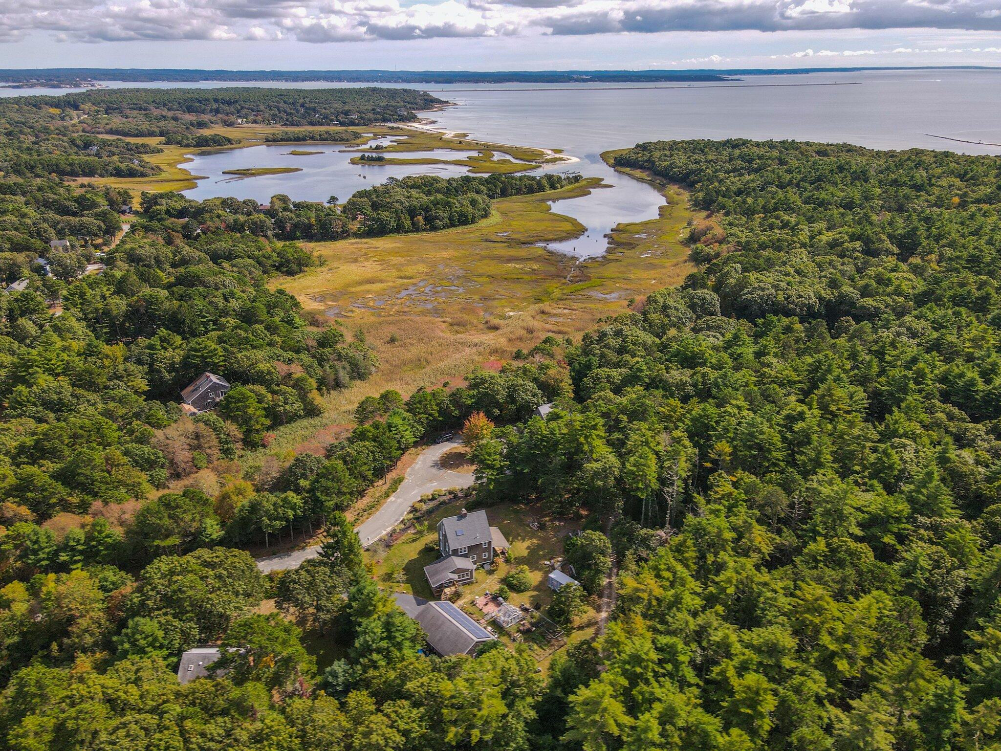 3 Fathom Lane Wareham, MA 02571 - Photo 57 of 57 a view of a lake with a city