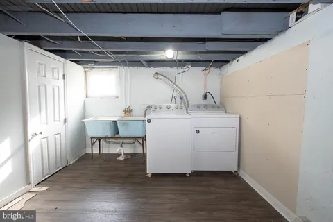 a utility room with washer and dryer