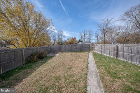 a view of backyard with green space