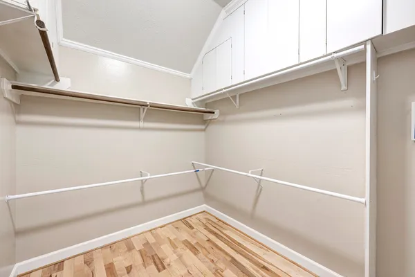 a view of an empty walk in closet