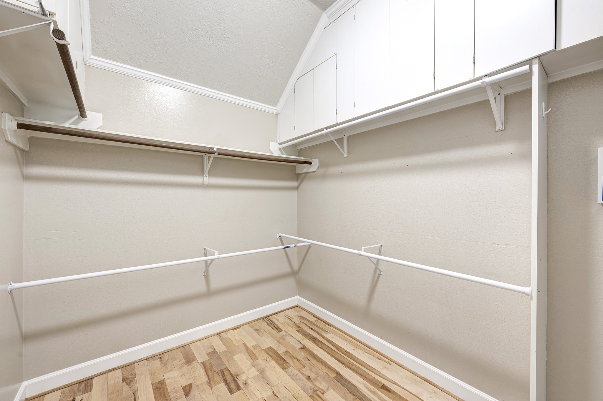 7019 Lawler Ridge Houston, TX 77055 - Photo 13 of 18 a view of an empty walk in closet