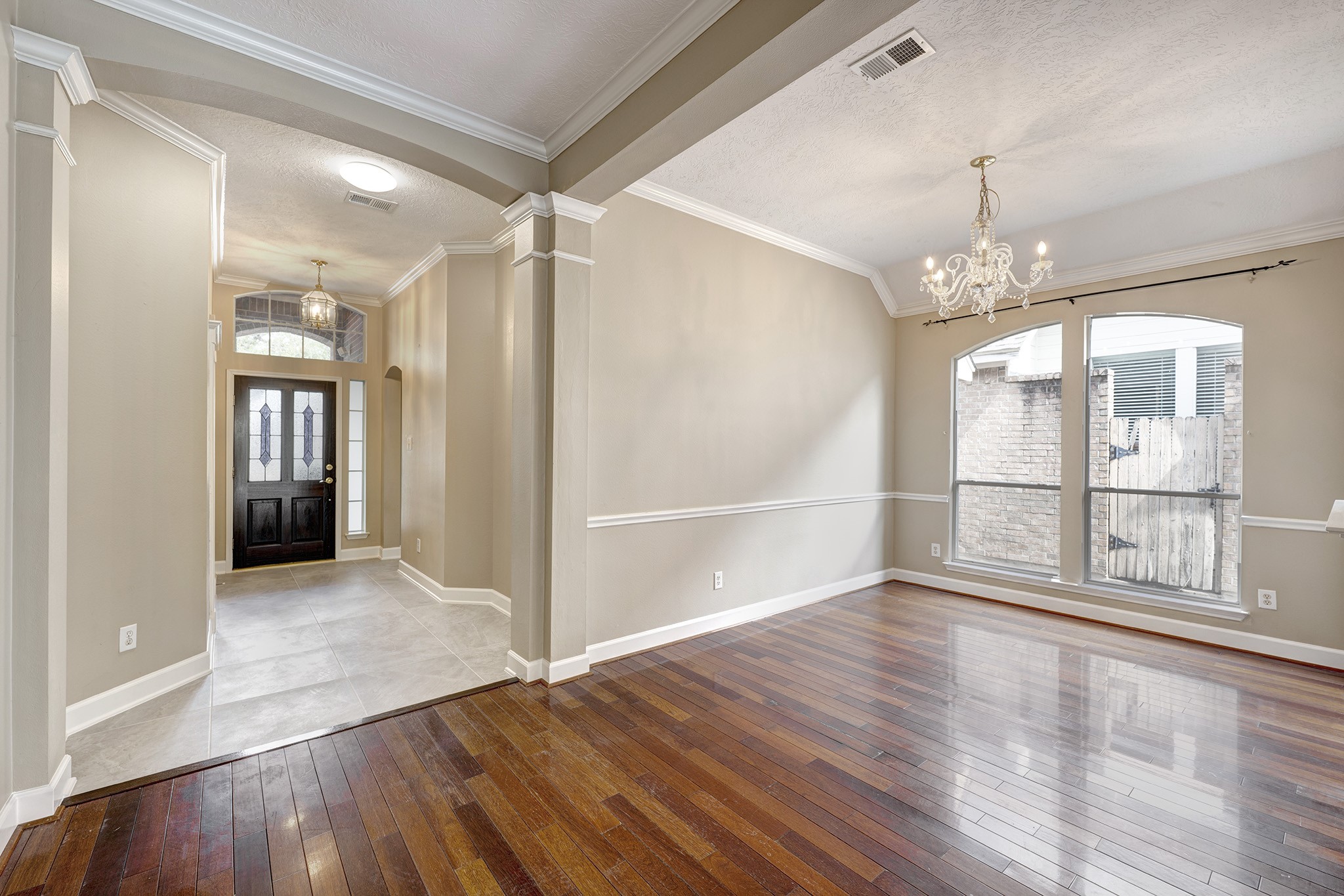 7019 Lawler Ridge Houston, TX 77055 - Photo 2 of 18 a view of livingroom with hardwood floor and window