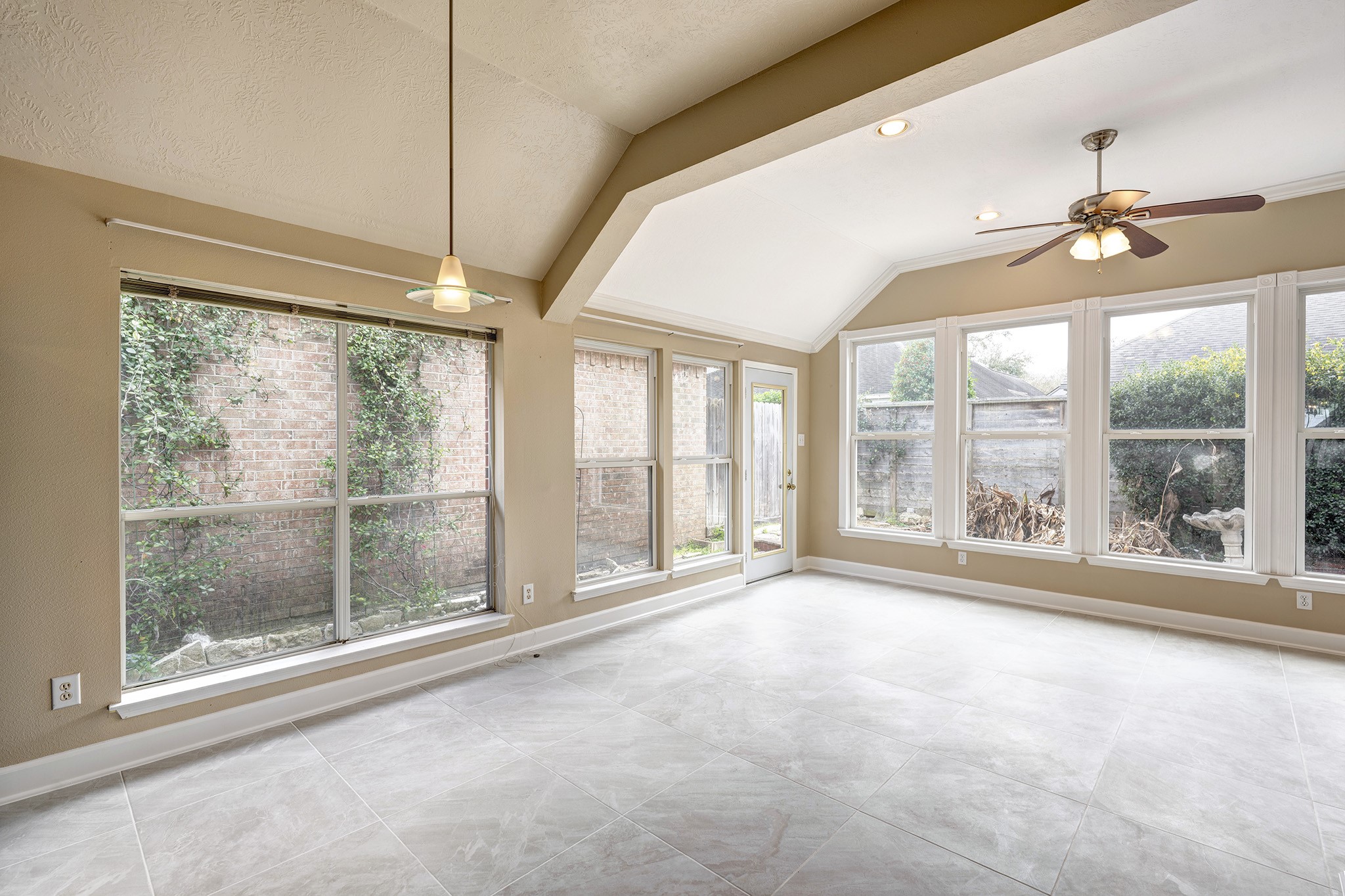 7019 Lawler Ridge Houston, TX 77055 - Photo 9 of 18 a view of an empty room with a window