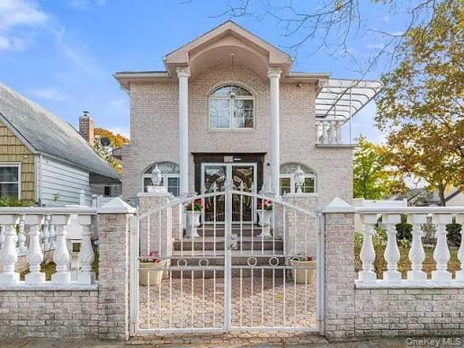 a front view of a building with a glass door