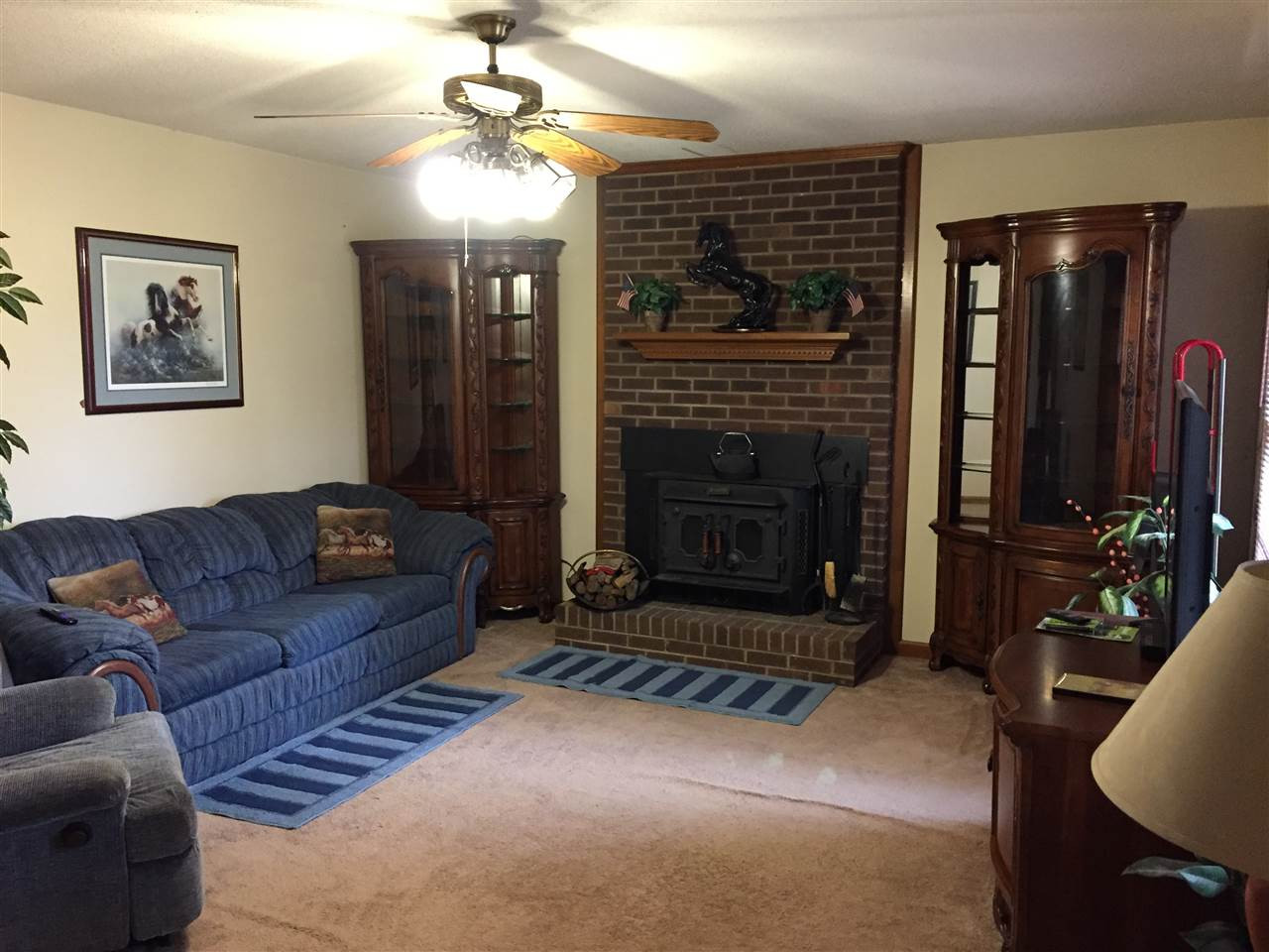 3213 Banks Road Raleigh, NC 27603 - Photo 5 of 16 Large Living Room with wood stove fire place. Large Living Room with wood stove fire place.