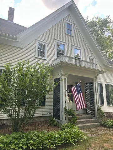 a front view of house with yard