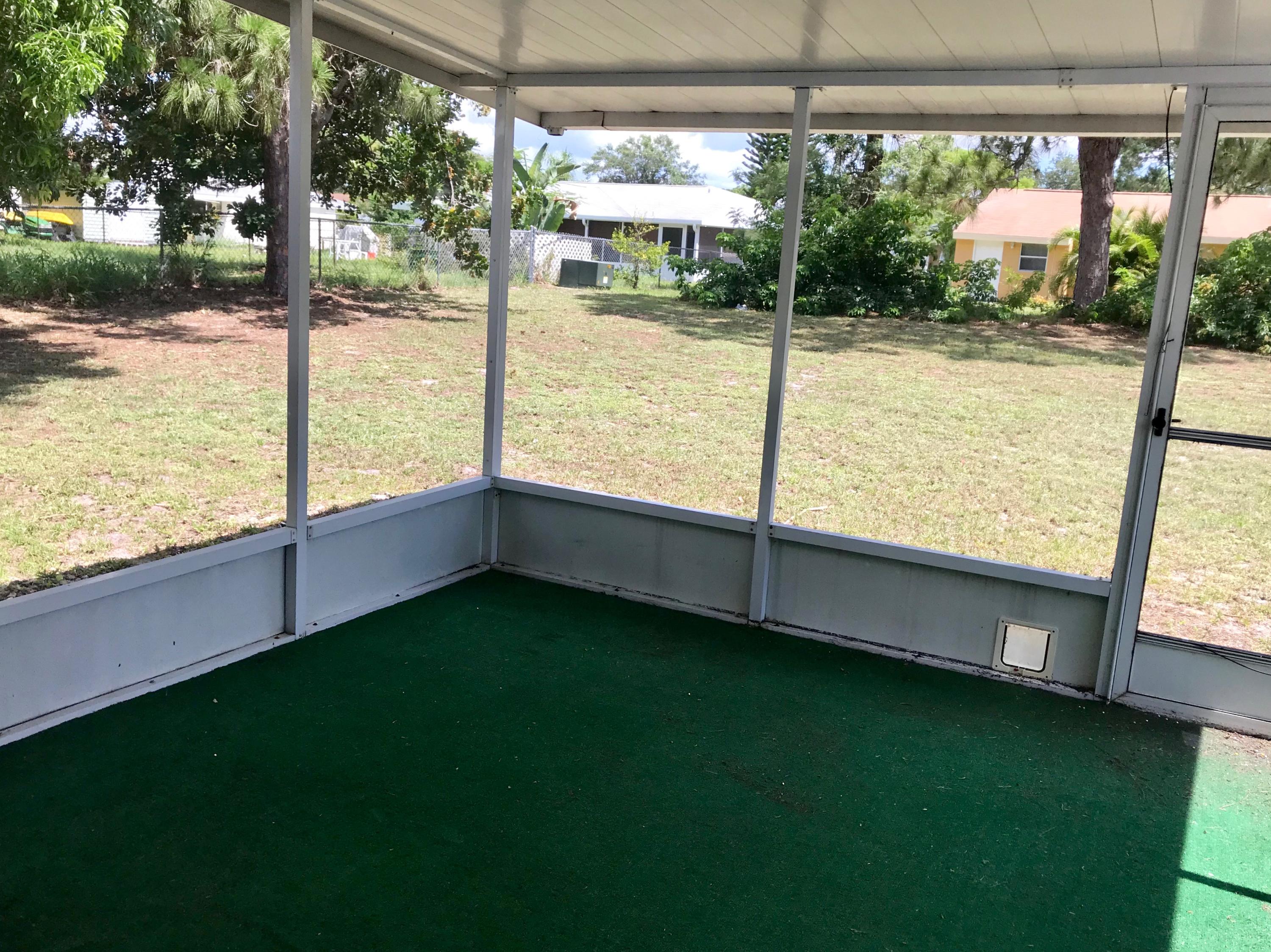233 Southwest Cherryhill Road Port St. Lucie, FL 34953 - Photo 15 of 21 Patio/Yard