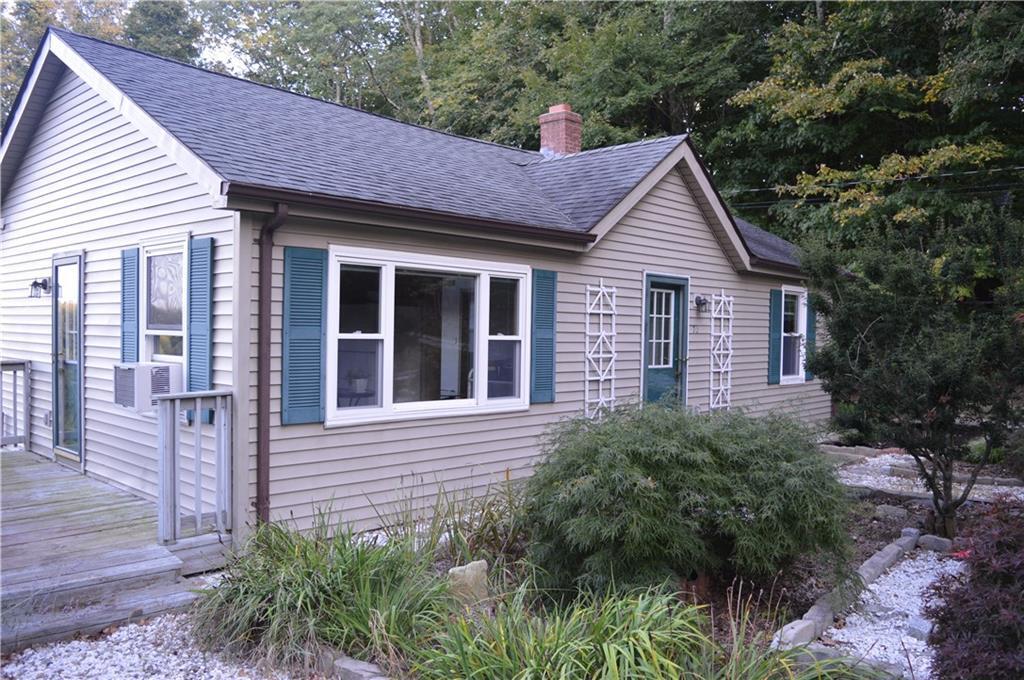 70 Bradley Road Pomfret, CT 06259 - Photo 1 of 1 a view of a house with a yard plants and large tree
