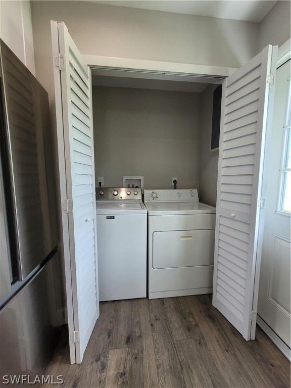 105 Alabama Road South Lehigh Acres, FL 33936 - Photo 16 of 25 a utility room with cabinets washer and dryer
