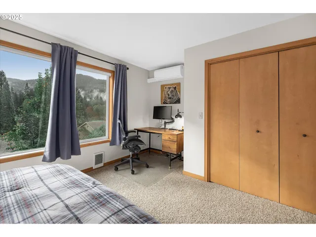 a bathroom with a sink vanity and mirror