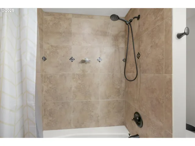 a bathroom with a sink vanity and a mirror