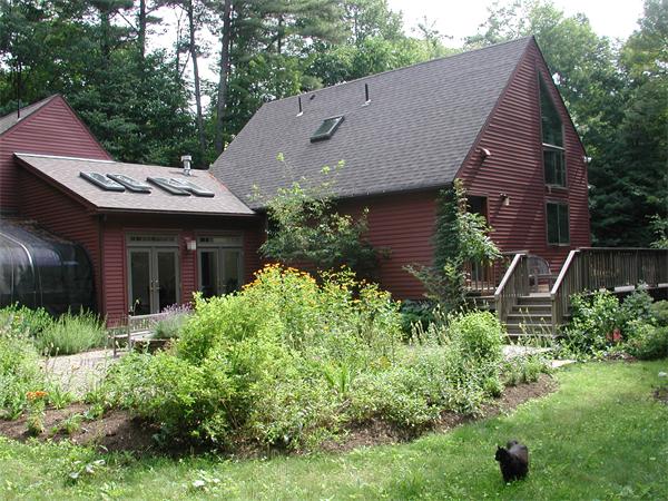 21 Gulf Road Pelham, MA 01002 - Photo 1 of 30 a aerial view of a house with yard and plants