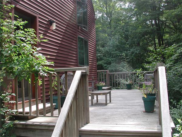 21 Gulf Road Pelham, MA 01002 - Photo 7 of 30 a patio with table and chairs