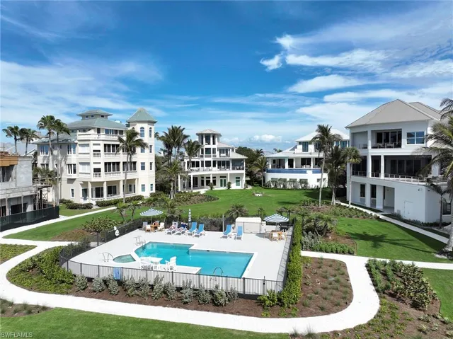 a view of a house with a yard porch and sitting area