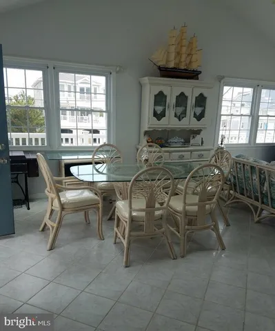 a bedroom with a bed and a table