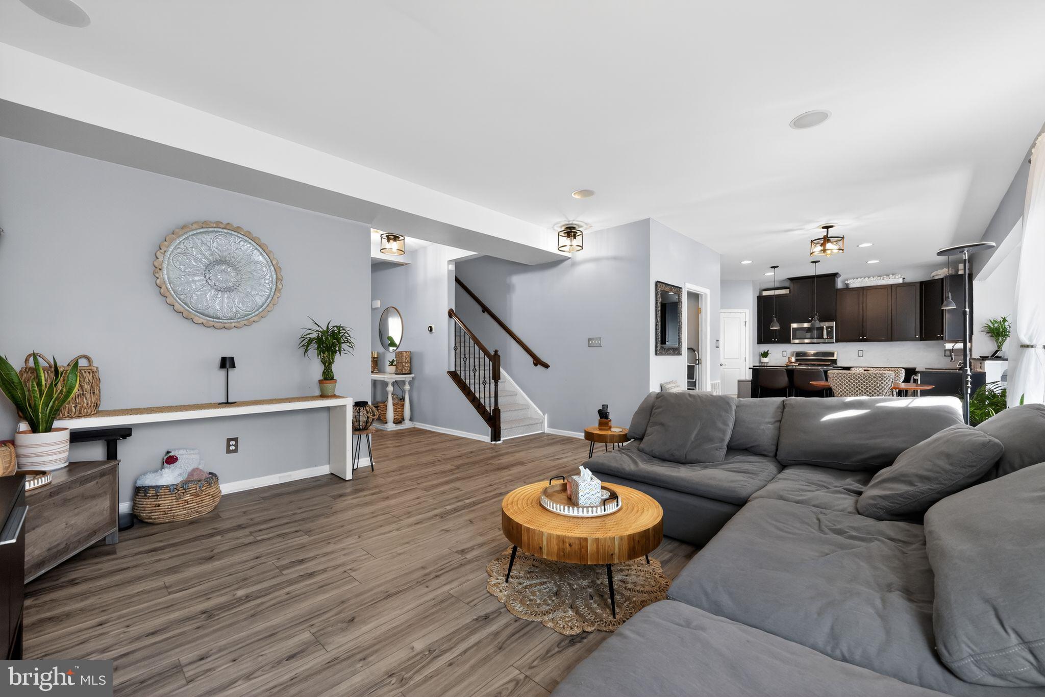 132 Redtail Hawk Circle Sewell, NJ 08080 - Photo 13 of 30 a living room with furniture and a wooden floor