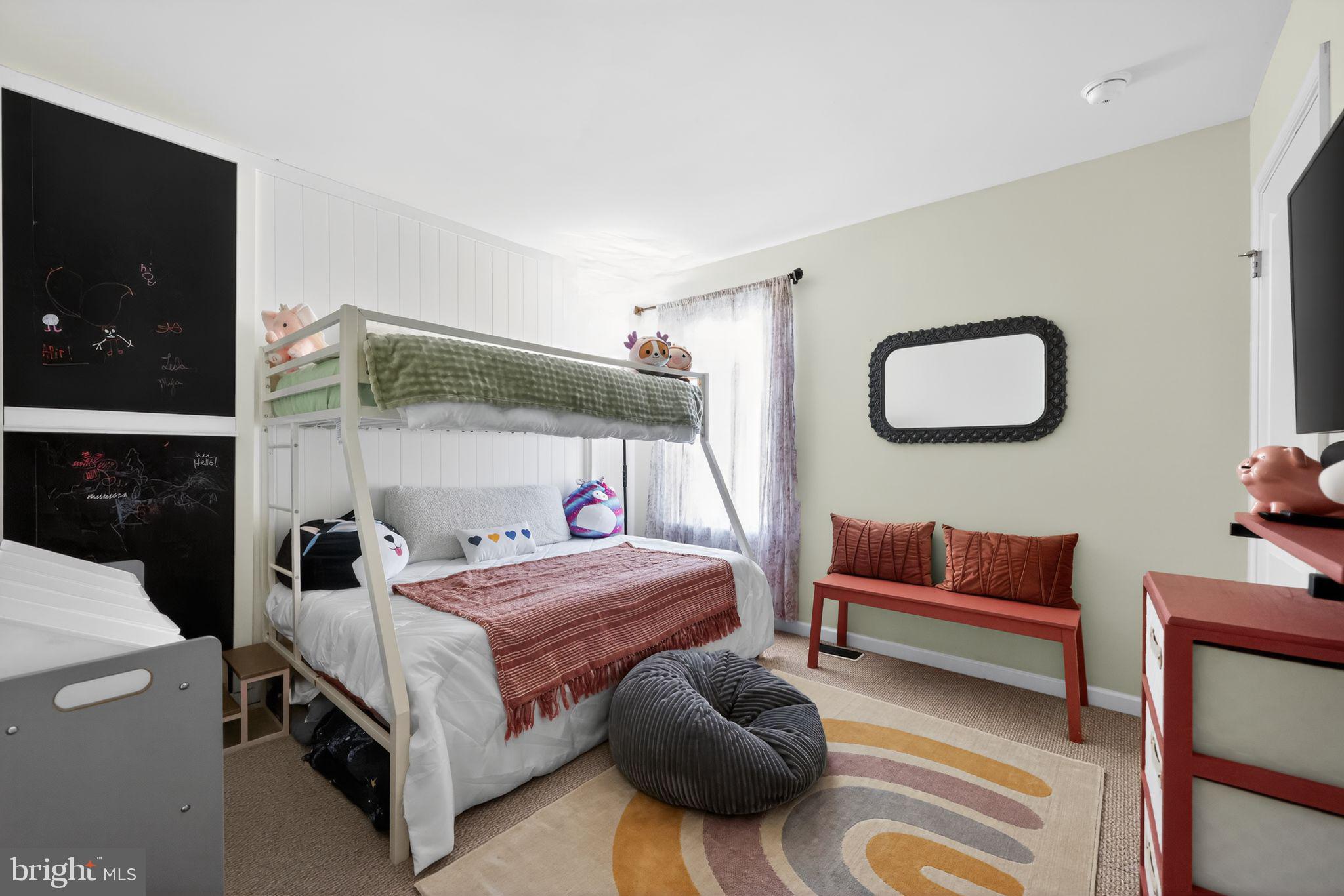 132 Redtail Hawk Circle Sewell, NJ 08080 - Photo 22 of 30 a bedroom with a bed and a couch