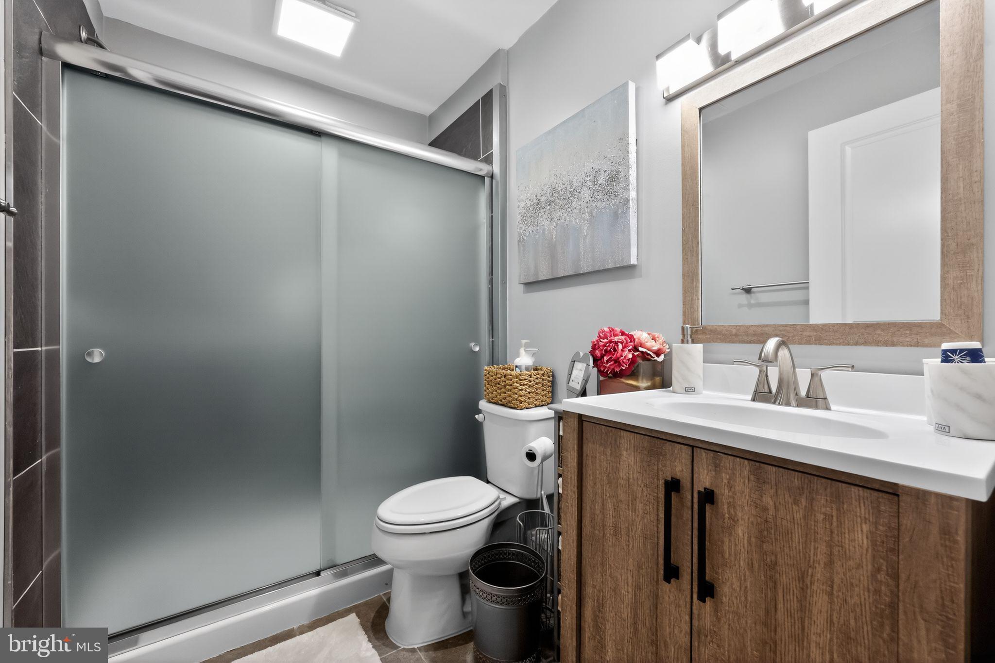 132 Redtail Hawk Circle Sewell, NJ 08080 - Photo 23 of 30 a bathroom with a sink toilet and shower