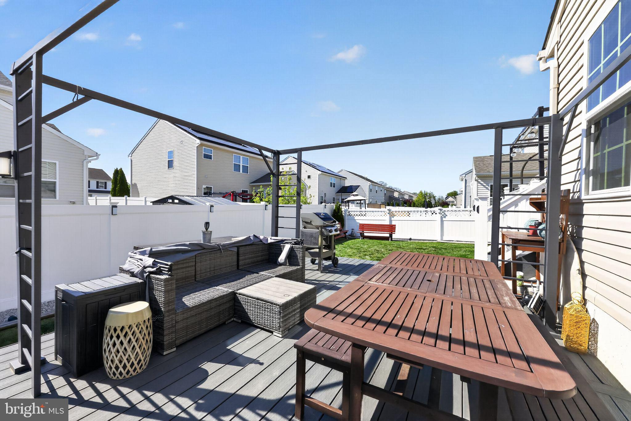 132 Redtail Hawk Circle Sewell, NJ 08080 - Photo 28 of 30 a outdoor space with patio the couches and a dining table with the kitchen view