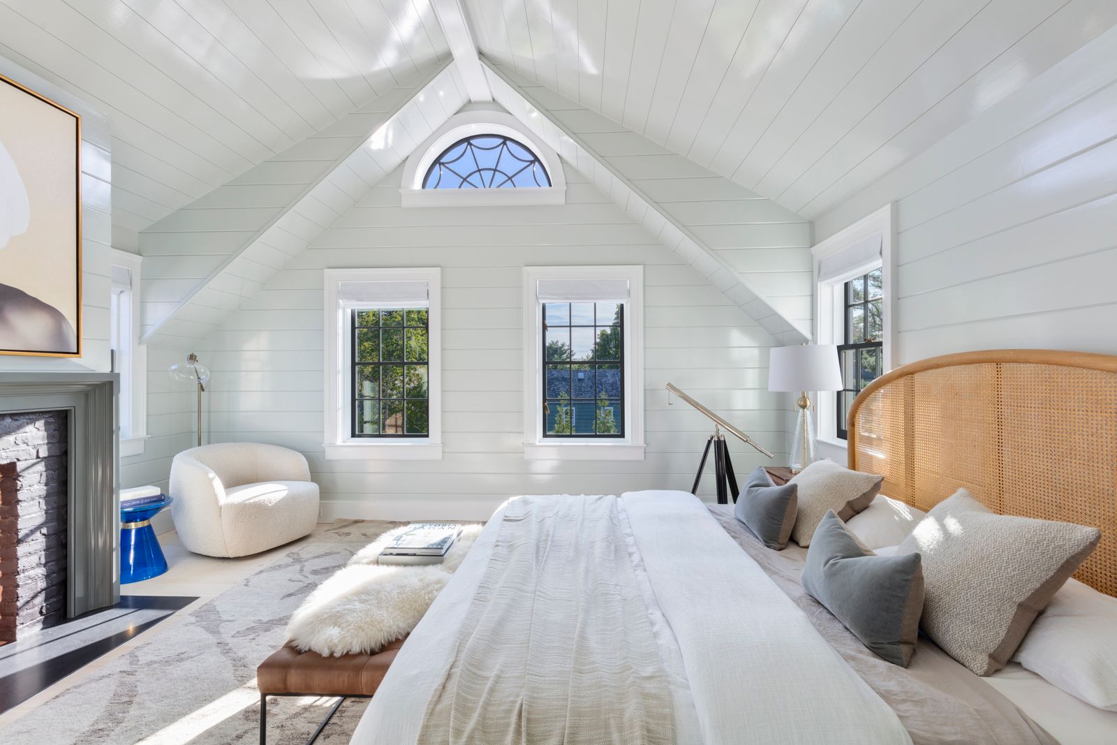 43 Howard Street Sag Harbor, NY 11963 - Photo 19 of 31 a bedroom with furniture and a large window