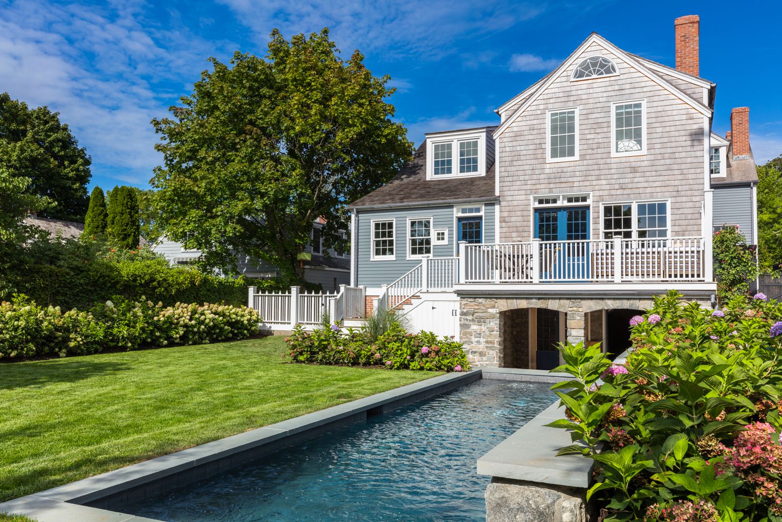 43 Howard Street Sag Harbor, NY 11963 - Photo 2 of 31 a front view of a house with garden